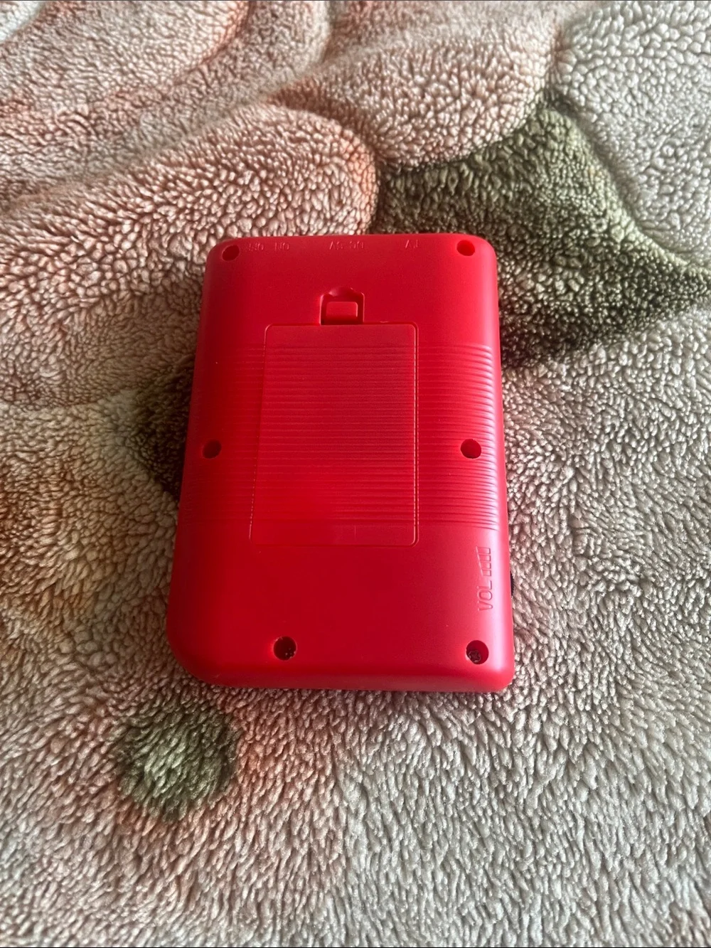 Compact Red Handheld Gaming Console with Classic Controls